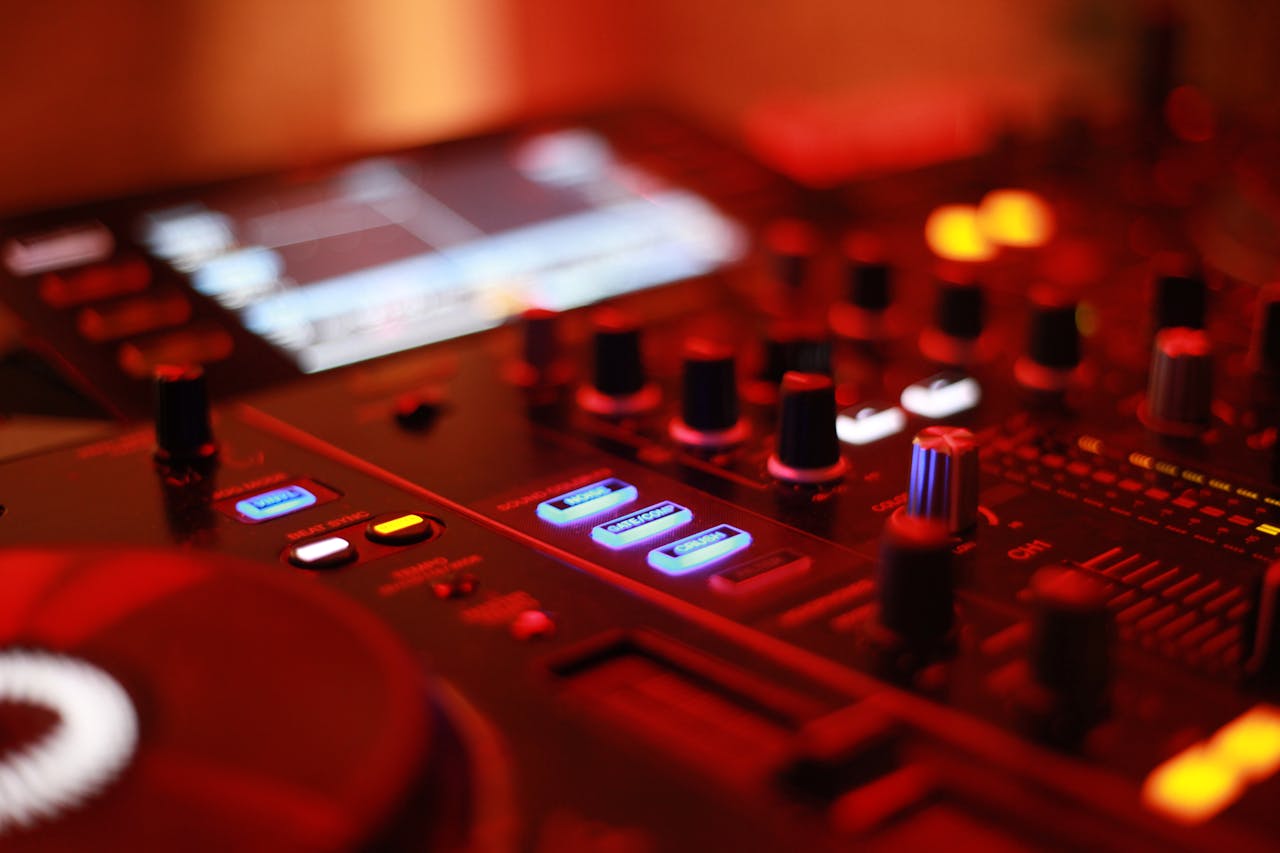 Selective Focus Photography of Turned-on Mixing Console